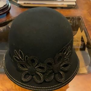 Fabulous black hat.  Top stitching in tan with subtle cut out details.  Gorgeous